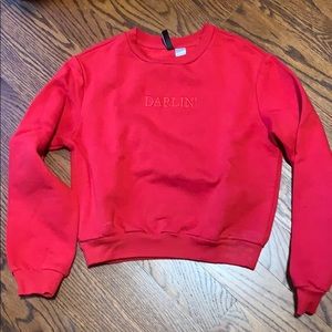 H&M divides sweatshirt